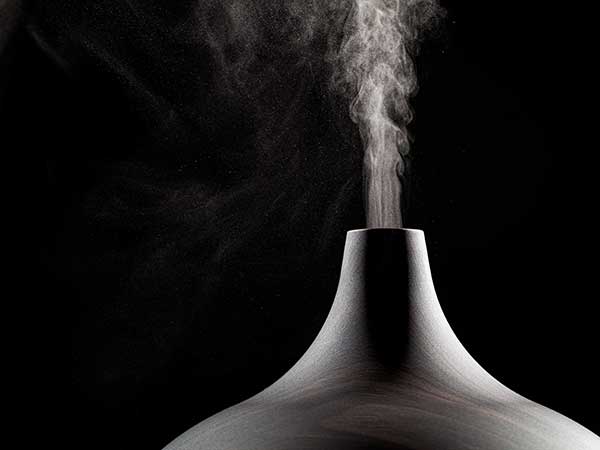 Close up of an ultrasonic aromatherapy oil diffuser in use.