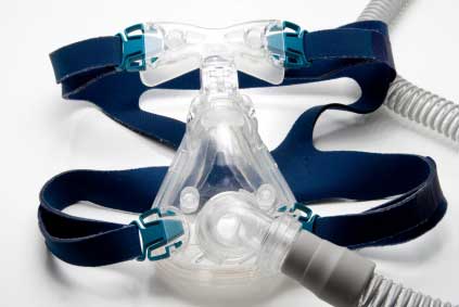 Sleep apnea mask with blue straps