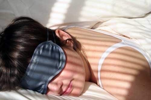 Lady wearing sleep eye mask